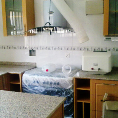Buy cream kitchen cabinet with black granite countertops in Lagos Nigeria